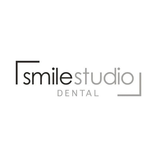 SmileStudio Dental logo with black 'Smile' and gray 'studio' typography and corner brackets around the wordmark.